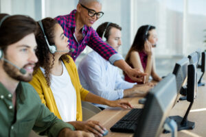 Group of employees working together, highlighting inclusion, equity, and diversity as part of a comprehensive talent acquisition strategy.